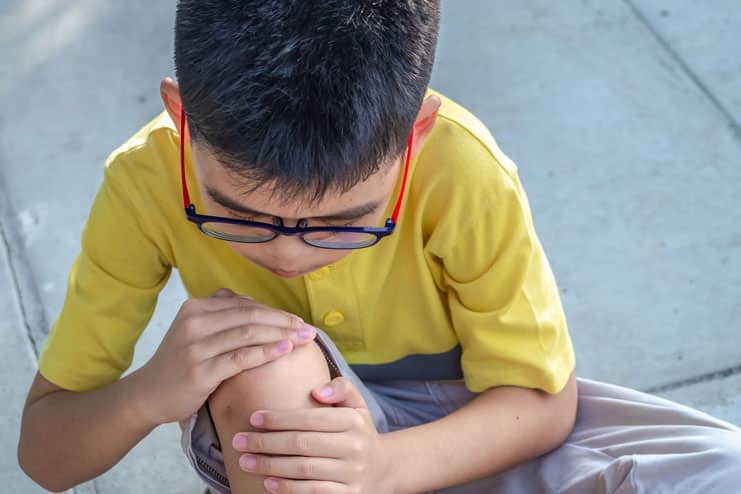 Knee Pain In Child Causes and Home Remedies
